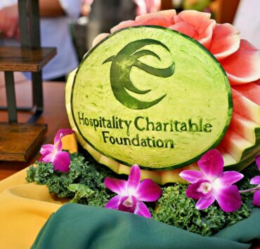 Guests gathered at a Las Vegas charity gala supporting local hospitality students, enjoying food and live entertainment under the stars.